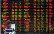Asia shares lower ahead of US jobs data