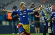 Chelsea's Spanish forward Fernando Torres celebrates with the trophy after winning the UEFA Champions League on May 19. Torres has cast doubt over his future at the newly-crowned European champions, labelling this past season as the most difficult of his career. (AFP Photo/Patrik Stollarz)
