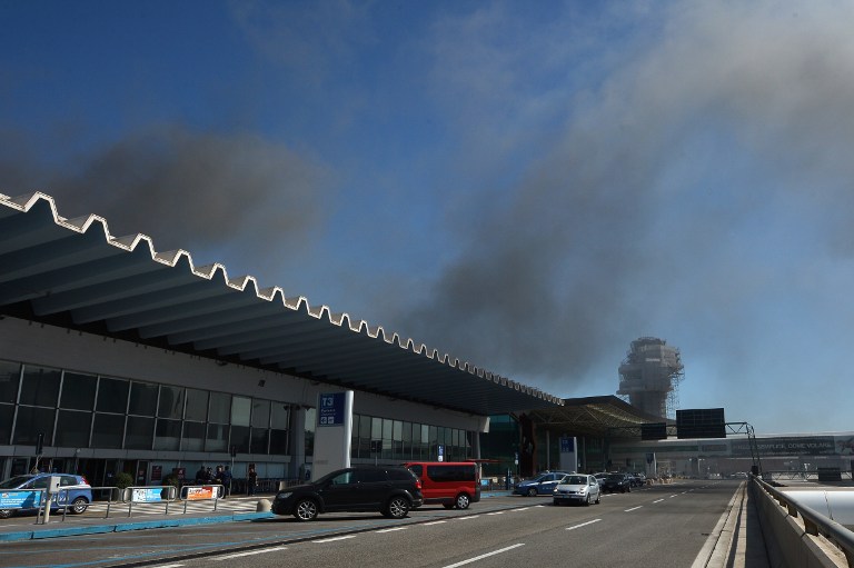 rome airport in chaos after fire devastates terminal