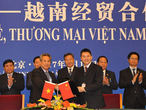 vns chinese firms shake hands
