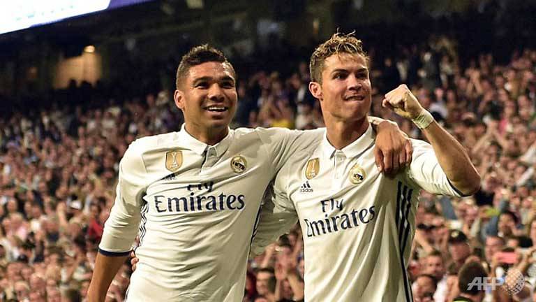 real madrid barcelona set up final day title showdown