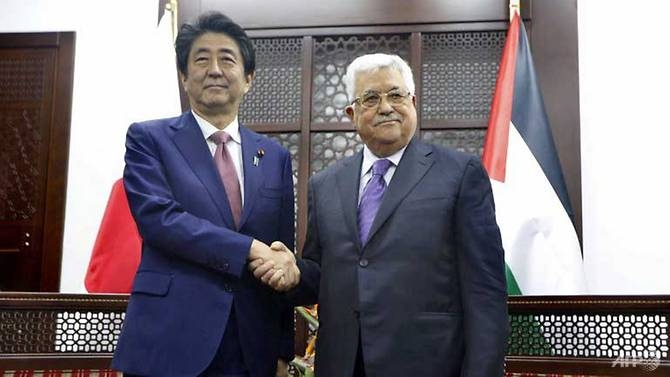 japanese pm pledges not to move its israeli embassy