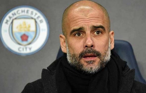 Guardiola signs new contract to remain at Man City until 2021