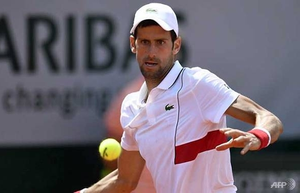 Djokovic reaches third round at Roland Garros, Zverev survives