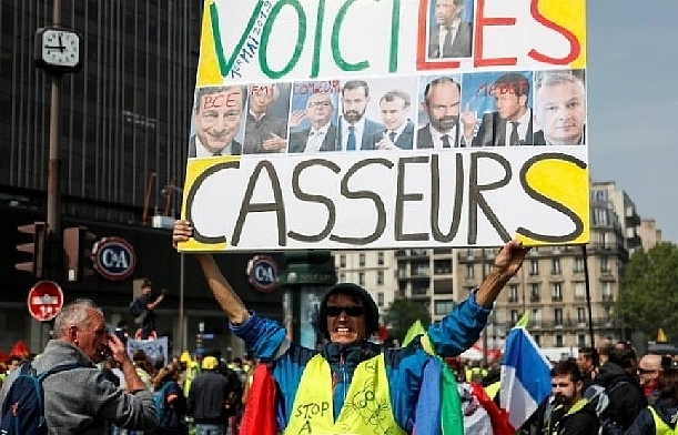 paris on edge as thousands gather for may 1 rallies