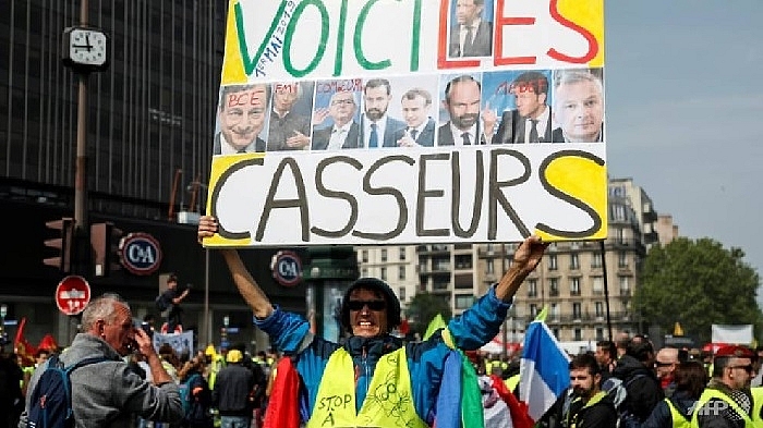 paris on edge as thousands gather for may 1 rallies