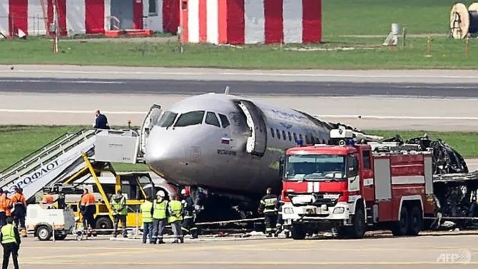 russia probes pilot error after deadly plane blaze