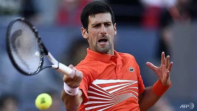 djokovic wins third madrid open title and 33rd masters