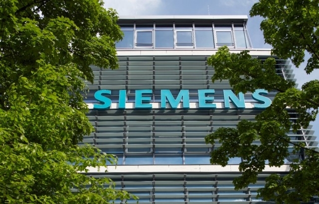 Siemens ups outlook after tripling profit in Q2