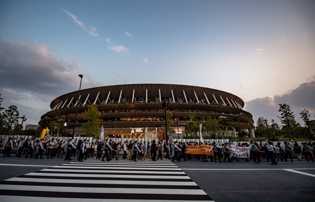 Olympic chief's Japan visit postponed over virus