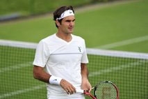 Federer wary of threats to seventh Wimbledon crown