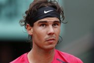 Rafael Nadal, seen here during his quater-final match against compatriot Nicolas Almagro, at French Open tennis tournament, at the Roland Garros stadium, on June 6, in Paris. Nadal's straight sets victory over Almagro brought up his 50th win at Roland Garros against just the one defeat - to Swede Robin Soderling in the 2009 fourth round.