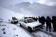 Snow, fog hamper search for missing Peru copter