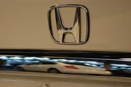 Honda plans to recall about 50,000 Civic sedans in the United States to fix a problem with the driveshaft, the Japanese automaker said Tuesday.
