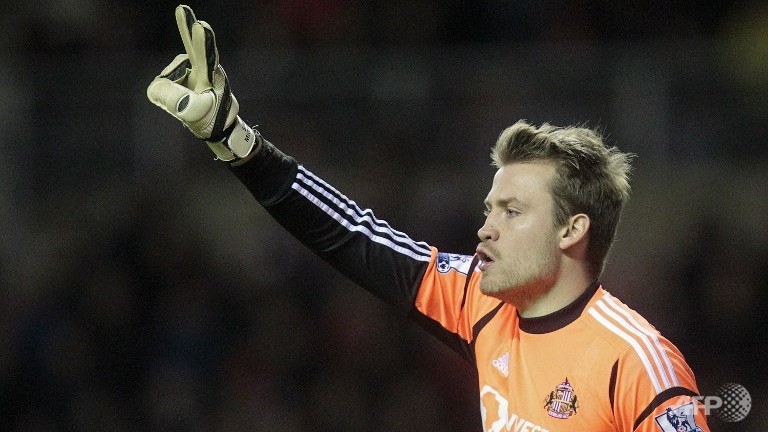 mignolet signs for liverpool