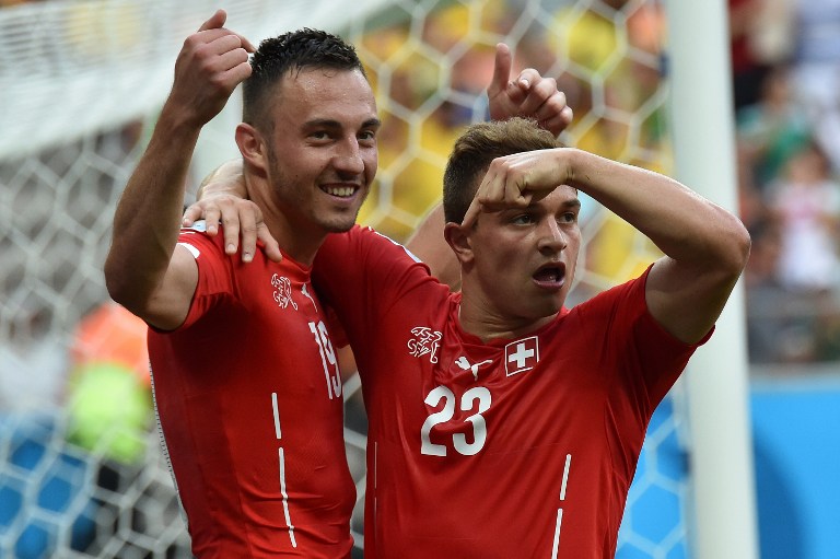 world cup swiss beat honduras to set up messi date