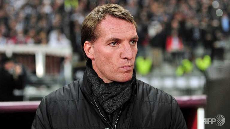 rodgers stays in liverpool hotseat after talks