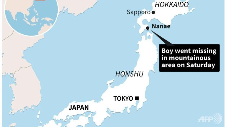 japan rescuers struggle with lack of clues for missing boy