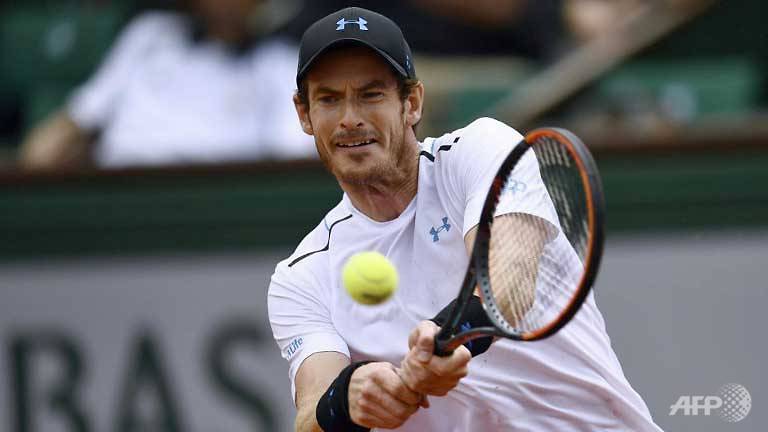 Murray, Wawrinka reach French Open quarter-finals