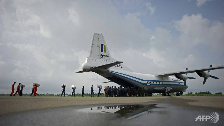 myanmar scours sea for 122 missing after plane disappears