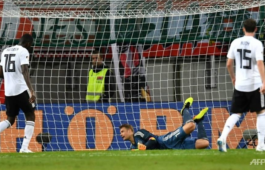Germany crash to Austria on Neuer's comeback