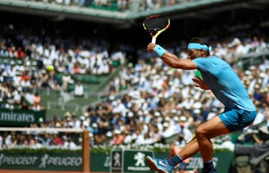 Nadal swats aside Gasquet to march on at Roland Garros