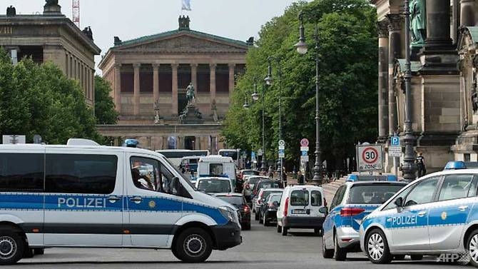 police shoot knife wielding man at berlin cathedral terror ruled out