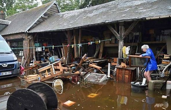 two dead as fresh storms sweep across france