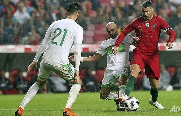 Ronaldo's return inspires Portugal past Algeria
