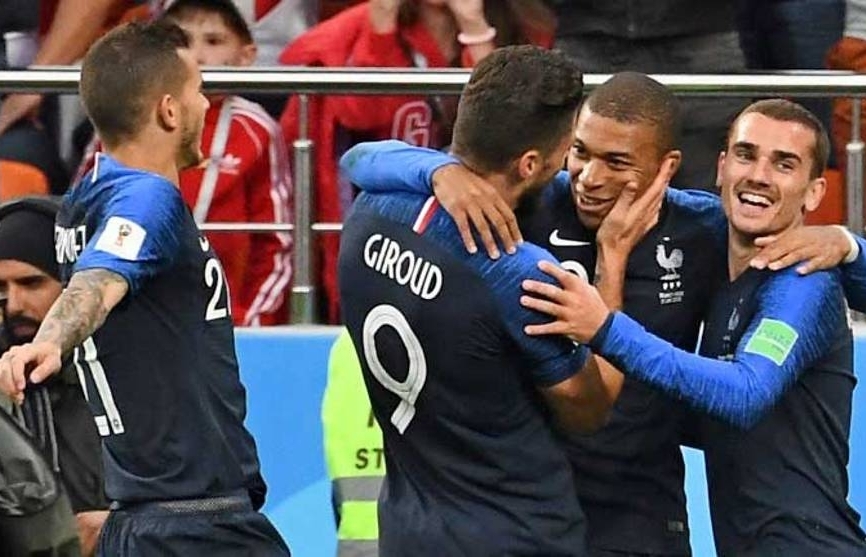 World Cup: Mbappe makes history as France battle into last 16