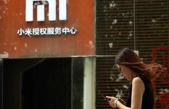 Xiaomi lowers target as it kicks off IPO