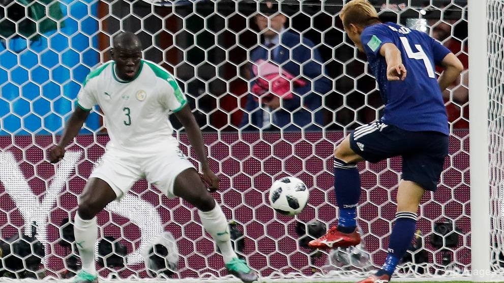 senegal japan play out 2 2 thriller to keep world cup last 16 hopes alive