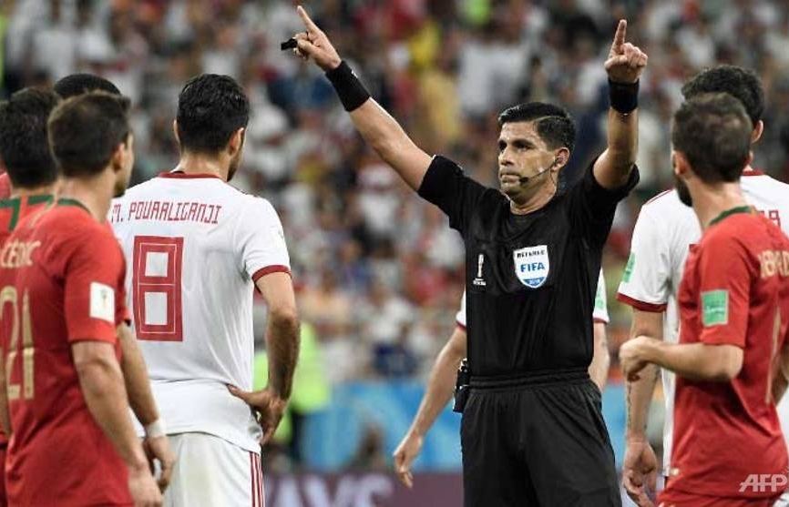 world cup var drama as portugal and spain reach last 16