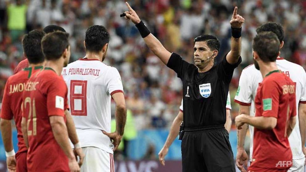 world cup var drama as portugal and spain reach last 16