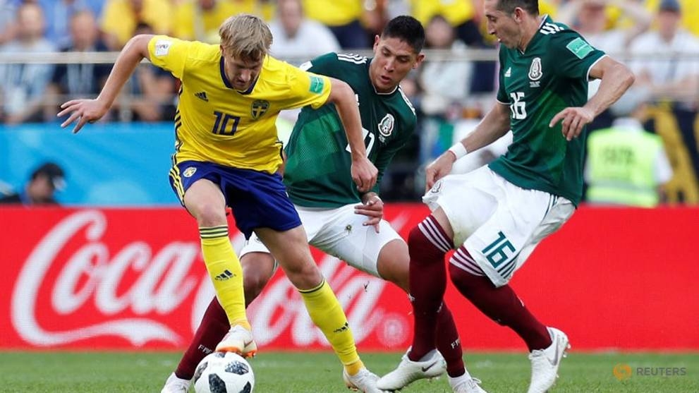 world cup swedes beat mexico 3 0 but both through to last 16