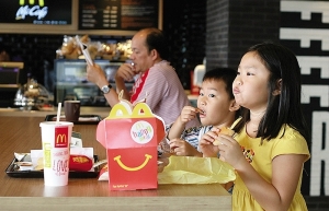 Fast food in fight to win over locals