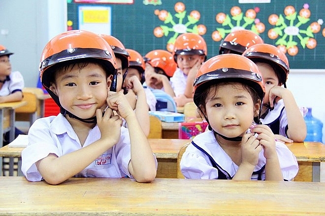 programme encourages children in yen bai to wear helmets