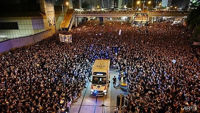 hong kong leader apologises after 2 million protesters take to streets