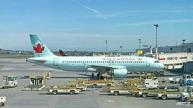 air canada passenger wakes up alone on empty dark plane at toronto airport reports