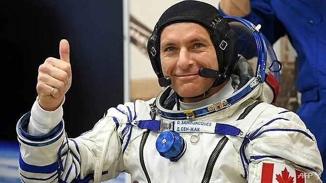 russian north american astronauts to return to earth