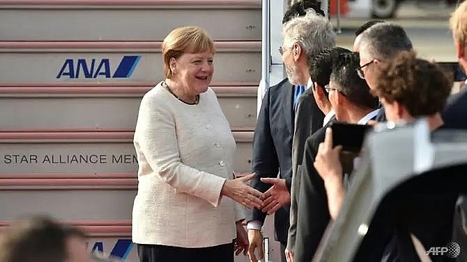 merkel arrives at g20 summit after shaking scare