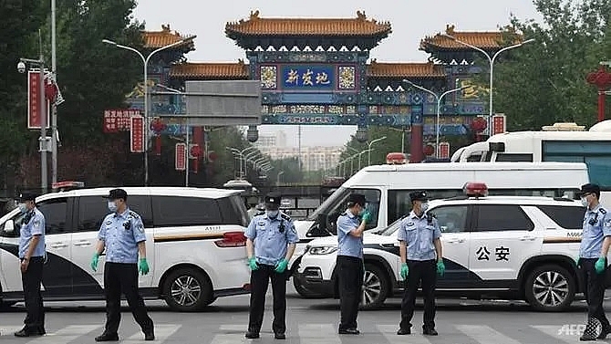 china reports 57 new covid 19 cases lockdowns imposed in parts of beijing