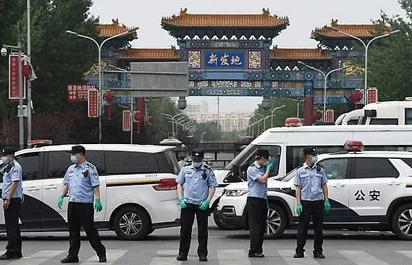 china reports 57 new covid 19 cases lockdowns imposed in parts of beijing