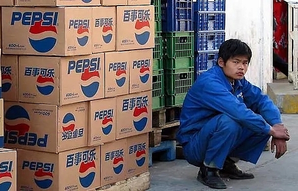 China bans some US chicken, shuts Pepsi plant to fight coronavirus