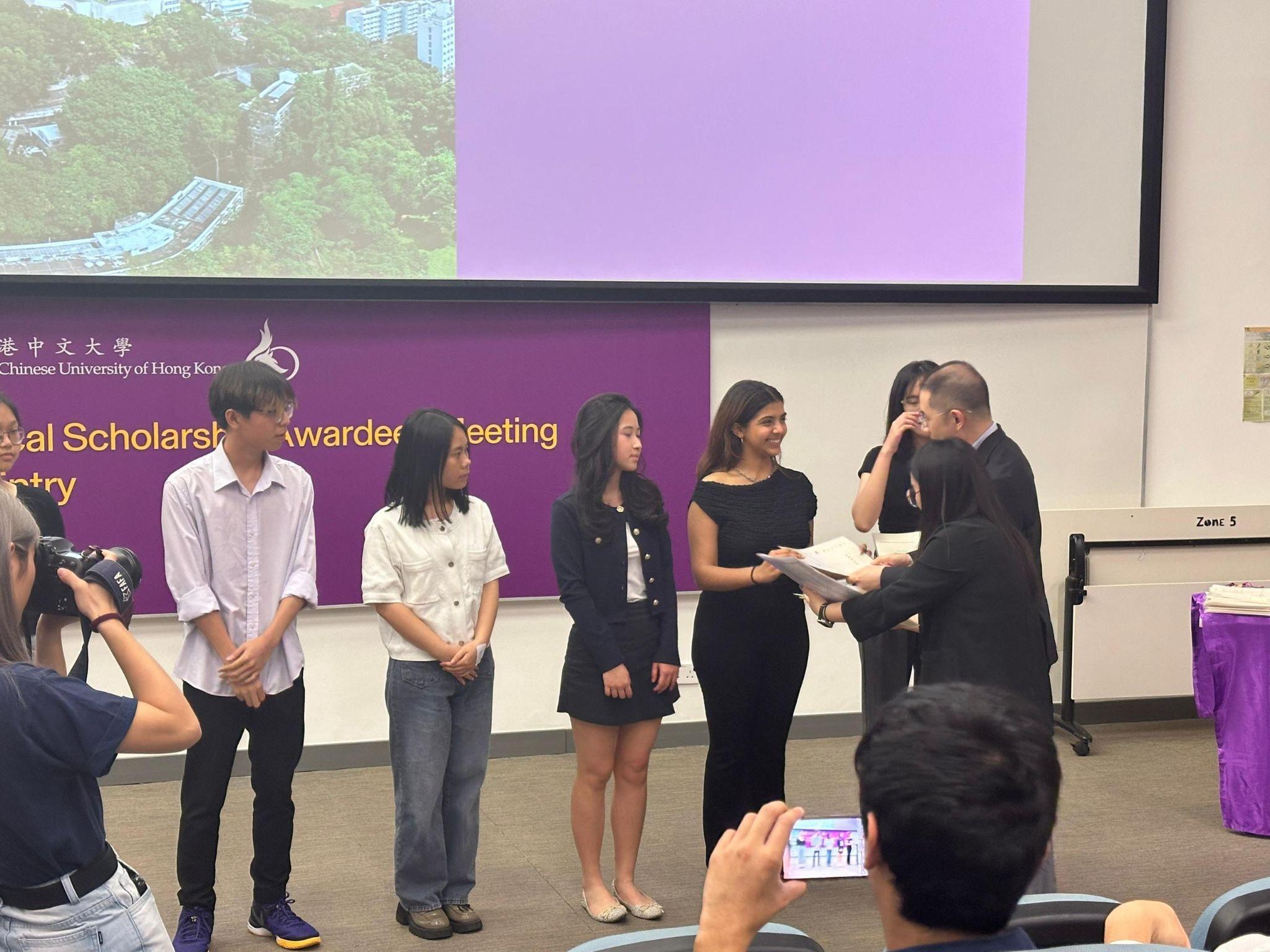 CUHK full scholarship awardee Sansita DEWANI (second from right) joins fellow recipients at the University's Scholarship Awards Ceremony, exemplifying CUHK's commitment to nurturing international talent.