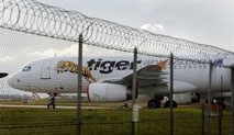 grounded tiger airways stops ticket sales