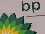 British energy giant BP said Tuesday that it plunged into a net loss in the second quarter of 2012, hit by lower oil prices and a huge impairment charge. (AFP Photo/Andrew Yates)