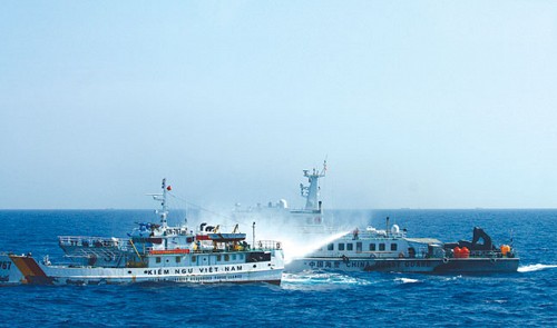 encroaching chinese vessel displays peaceful co existence banner in vietnamese waters