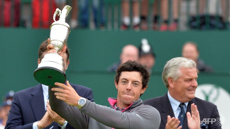 mcilroy holds on to win british open