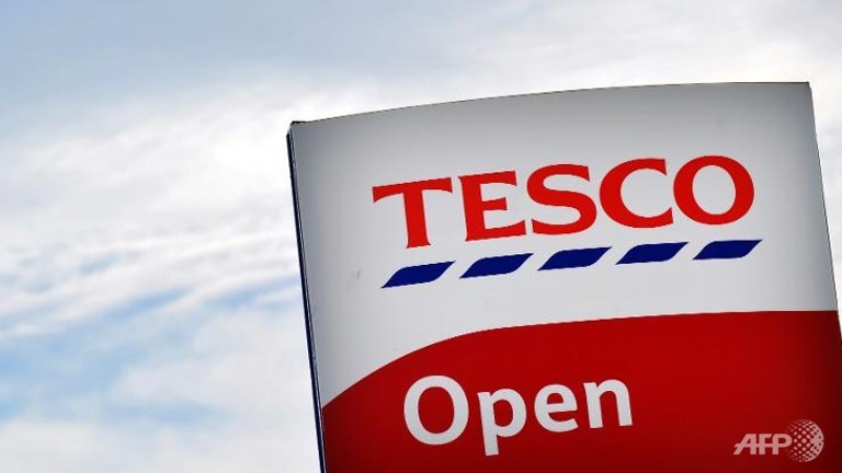 tesco chief executive to step down amid profit warning